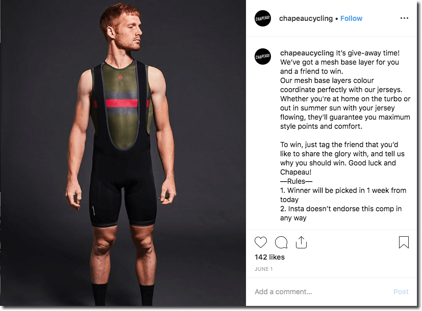 Screenshot of an Instagram giveaway for cycling clothes. The main image shows a young, red-haired man wearing a mesh base layer. The caption describes the product in detail and asks people to comment and tag friends for a chance to win.