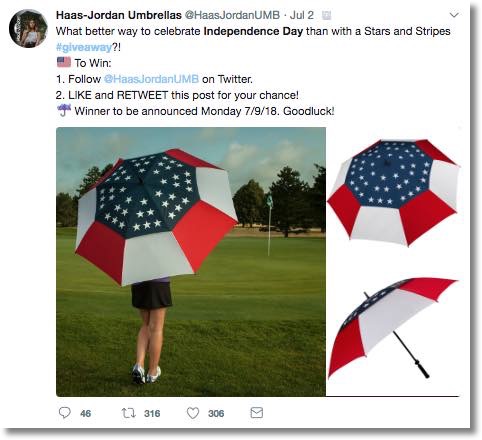 Screenshot of an Independence Day giveaway on Twitter. The image shows a young woman walking across a golf course, with her back to the camera. She is carrying a stars and stripes umbrella. Inset images show the umbrella in more detail. The caption invites users to follow, like, and retweet the post for the chance to win an umbrella.