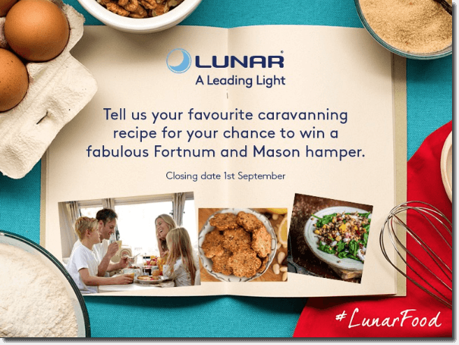 The image shows a book open on a table, surrounded by eggs, nuts, a bowl of sugar, a bowl of flour, and a whisk. The text in the book reads: Lunar, a Leading Light. Tell us your favourite caravanning recipe for your chance to win a fabulous Fortnum and Mason hamper. Closing date 1st September.